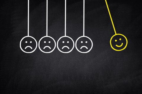 Traurige Smileys, ein glücklicher Smiley