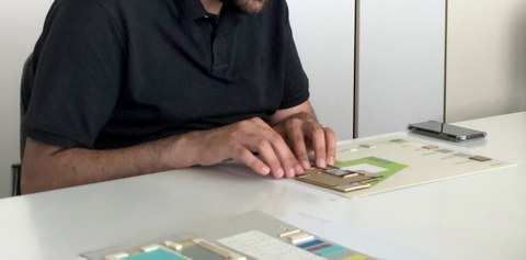 Seeing with his hands: A blind architect explores a tactile floor plan created by students in the course "Inclusion in Architecture"