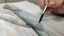 Pinsel mit Aquarell