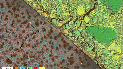 Geopolymer-impregnated carbon yarn embedded in concrete