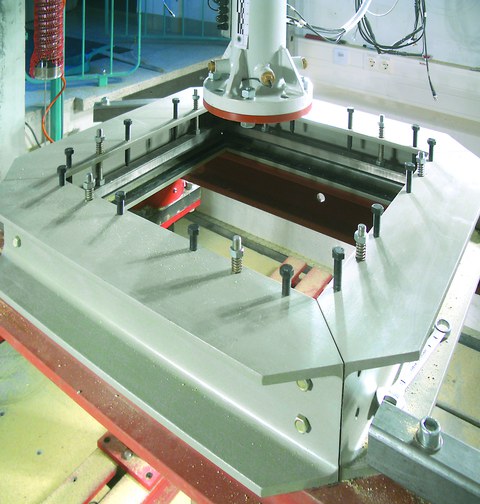 Impact test set-up with clamping device for TRC plates