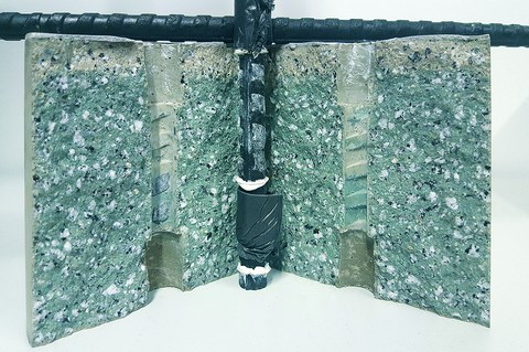 Sheared carbon ribs after pull-out test on carbon rod