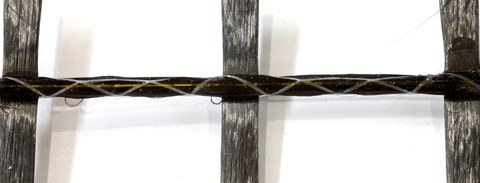 Application of a fiber-optic sensor on a single carbon yarn