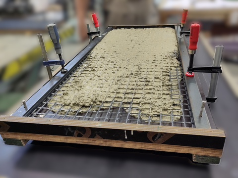 Concreting the tension test specimens