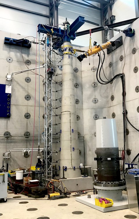 Experimental investigations on large-scale wind turbine tower structures
