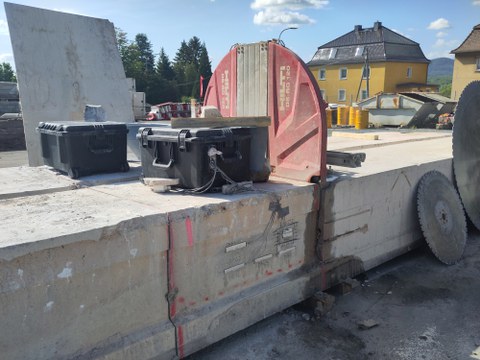 Prestressed precast bridge girder with applied strain gauges applied to measure strain recovery during concrete sawing operations
