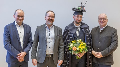 Enrico Baumgärtel und die anwesende Promotionskommission