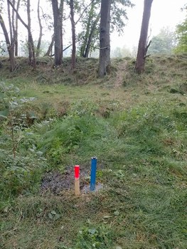Final groundwater monitoring station with integrated piezometer