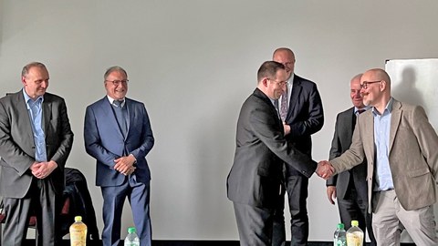 Gratulation nach der erfolgreichen Verteidigung