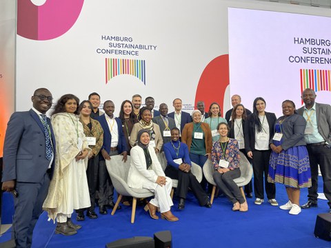 Group photo on a stage of the Hamburg Sustainability Conference