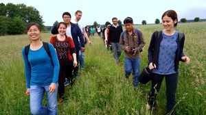 Participants walking in single file during an excursion in Upper Lusatia