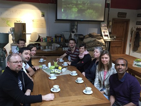 All group drinking coffee