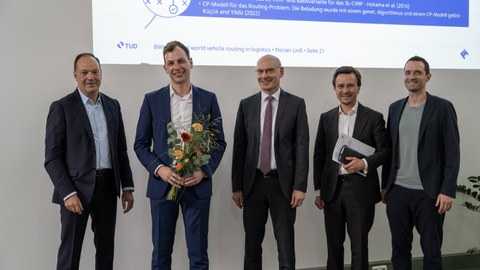 Group photo with four professors and Florian Linß