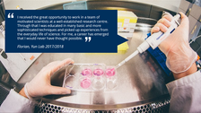 Photo of the inner of a cleanbench with someone pipetting as background for quote of the FSJ volunteer Florian.