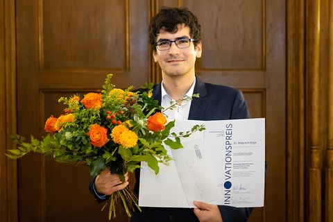 Dr. Wojchiech Ozga