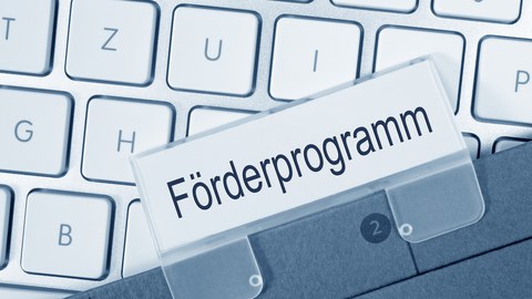Tastatur mit Schriftzug Förderprogramme