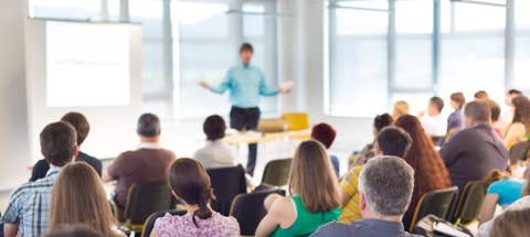 Speaker at business convention and presentation