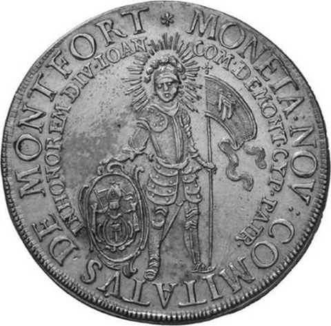 Zu sehen ist eine silberne Münze mit Prägung.