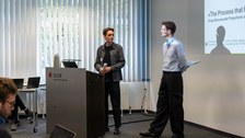 Sprecher:innen während des Symposium