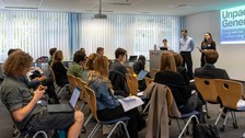 Sprecher:innen während des Symposium