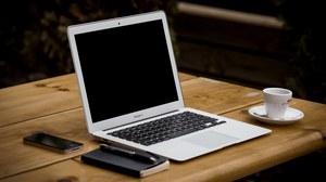Desk with Laptop and Cup