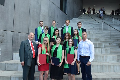 The graduates, together with the dean of the Economic Faculty of TU Liberec, professor Kocourek, and the academic assistant of the director of IHI Zittau, Mr. Oliver Tettenborn