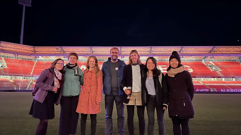 Photo of the team taken at the football stadium in Nuremberg during NaMa conference