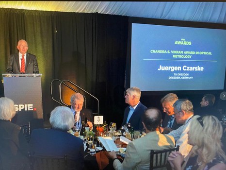 Prof Juergen Czarske delivers a speech as recipient of the Chandra S Vikram Award of SPIE during the award ceremony in San Diego
