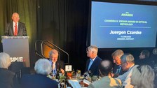 Prof Juergen Czarske delivers a speech as recipient of the Chandra S Vikram Award of SPIE during the award ceremony in San Diego