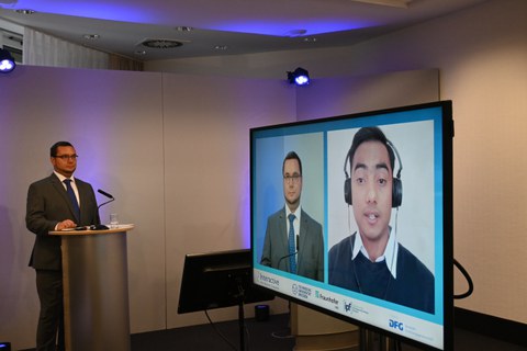 Foto mit Impressionen und Referenten vom GRK-Kolloquium 2021