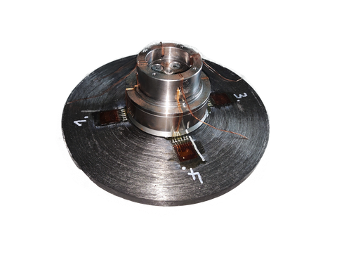 Disc with a raised section in the centre. 