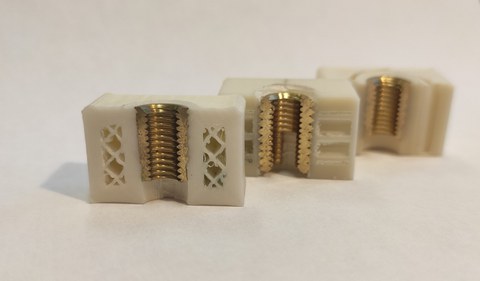 Metallic threaded inserts.