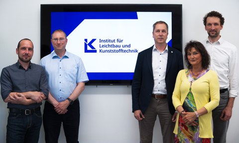 nstitute board (from left to right): PD Dr.-Ing. habil. Robert Kupfer, Dr.-Ing. Jörn Jaschinski, Institute Director Prof. Dr.-Ing. habil. Maik Gude, Dipl.-Ing. Barbara Röllig, Dr.-Ing. Sebastian Spitzer. In the center, the new ILK logo is displayed.