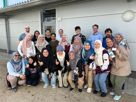 Gruppenfoto einer Besuchergruppe aus Malaysia.