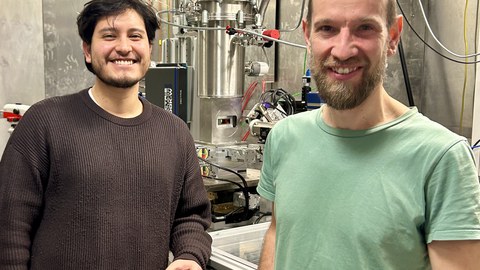 Two proud researchers
