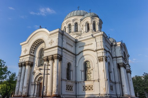 church building with bright walls and round forms