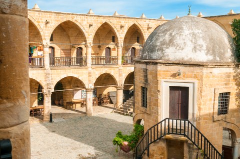 central courtyard of a building with archways