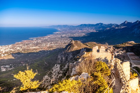 panorama of the coastline and mountains as seen from a castle