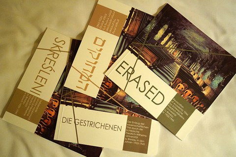The photo shows Kai Kranich's Magister printed thesis in four different languages.