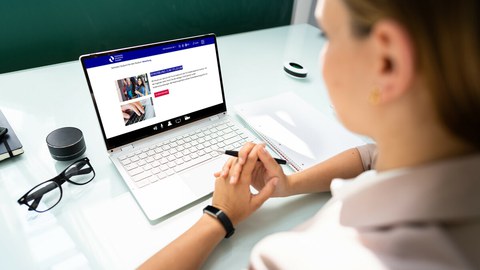 Laptop screen with application web page