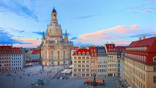 Photo of Dresden's Neumarkt square with the Frauenkirche church at sunset