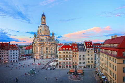 Photo of Dresden's Neumarkt square with the Frauenkirche church at sunset