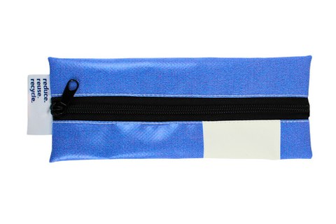 A patterned PVC bag with a long shoulder strap against a light background.The bag has a long adjustable strap and a small TU Dresden logo in the bottom corner.