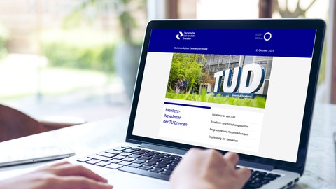 Aufgeklappter Laptop, auf dem Display ist der geöffnete Exzellenz-Newsletter der TUD zu sehen 