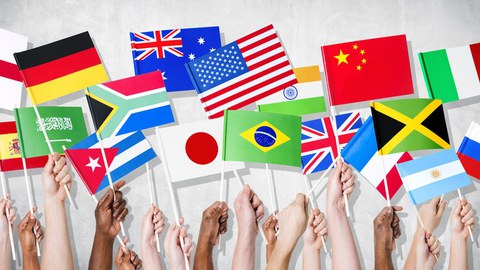 Multi-Ethnic Group of People Holding National Flags