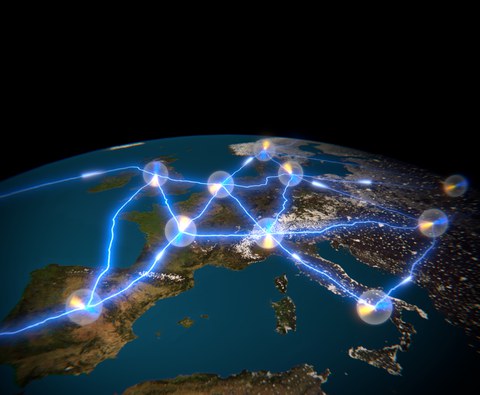 Satellitenfoto der Erde bei Nacht, eingezeichnet verschiedene Leuchtpunkte, die miteinander verbunden sind.