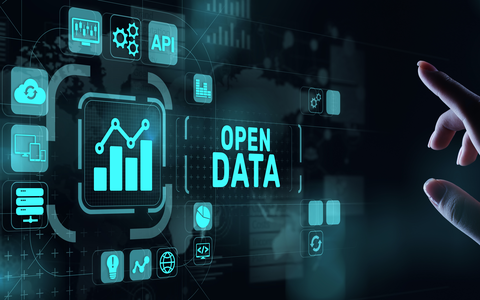 Visualisierung eines Touch-Bildschirms, auf dem unterschiedliche Symbole in Kacheln abgebildet sind. In deren Mitte befindet sich ein Diagramm. Rechts davon ist der Schriftzug "Open Data" zu erkennen.