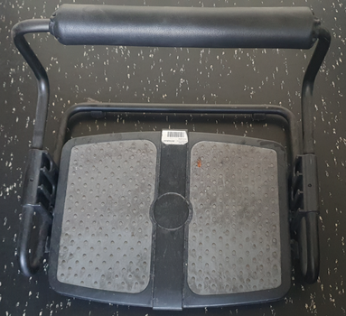 The photo shows a direct top view of the foot rocker.