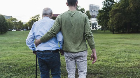 Foto mit zwei Personen, die von hinten abgebildet sind