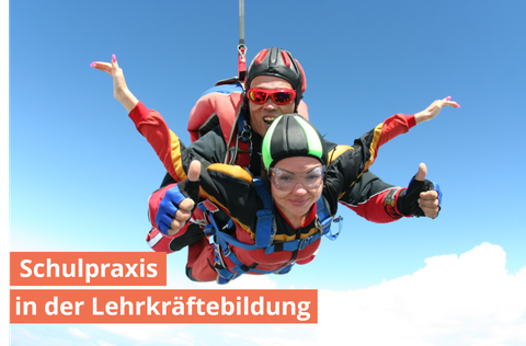 Foto: Zwei Personen während eines Fallschirmsprungs